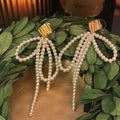 Faux Pearl Bow & Gold Leaf Earring
