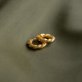 Twisting Gold Hoop Earring